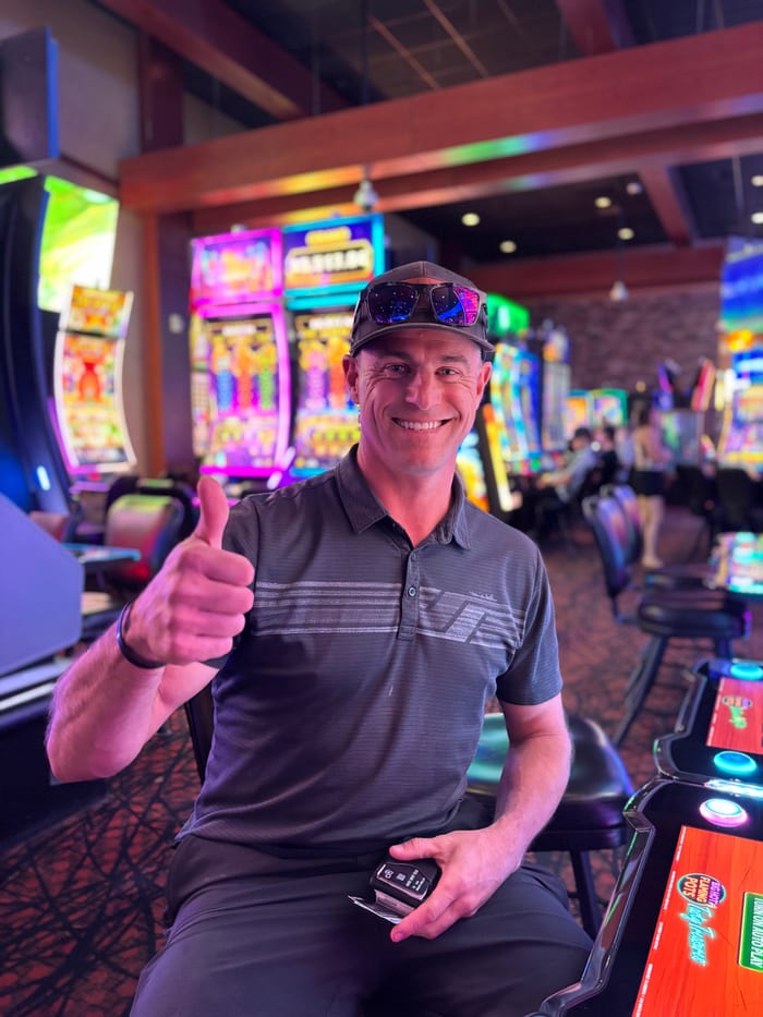 Brian Miller celebrating his jackpot win at Indian Head Casino